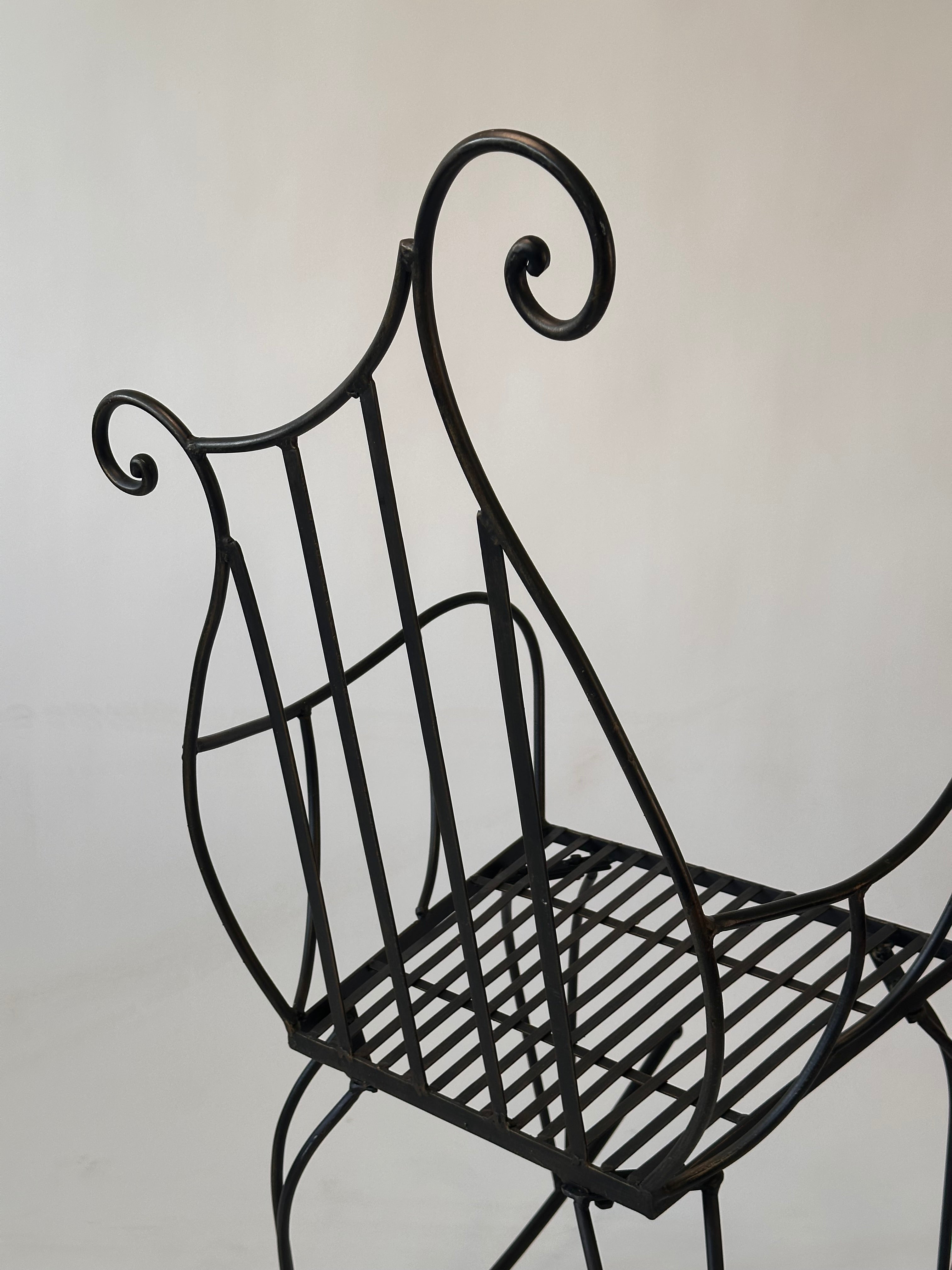 Chaise à bascule artisanale en fer forgé