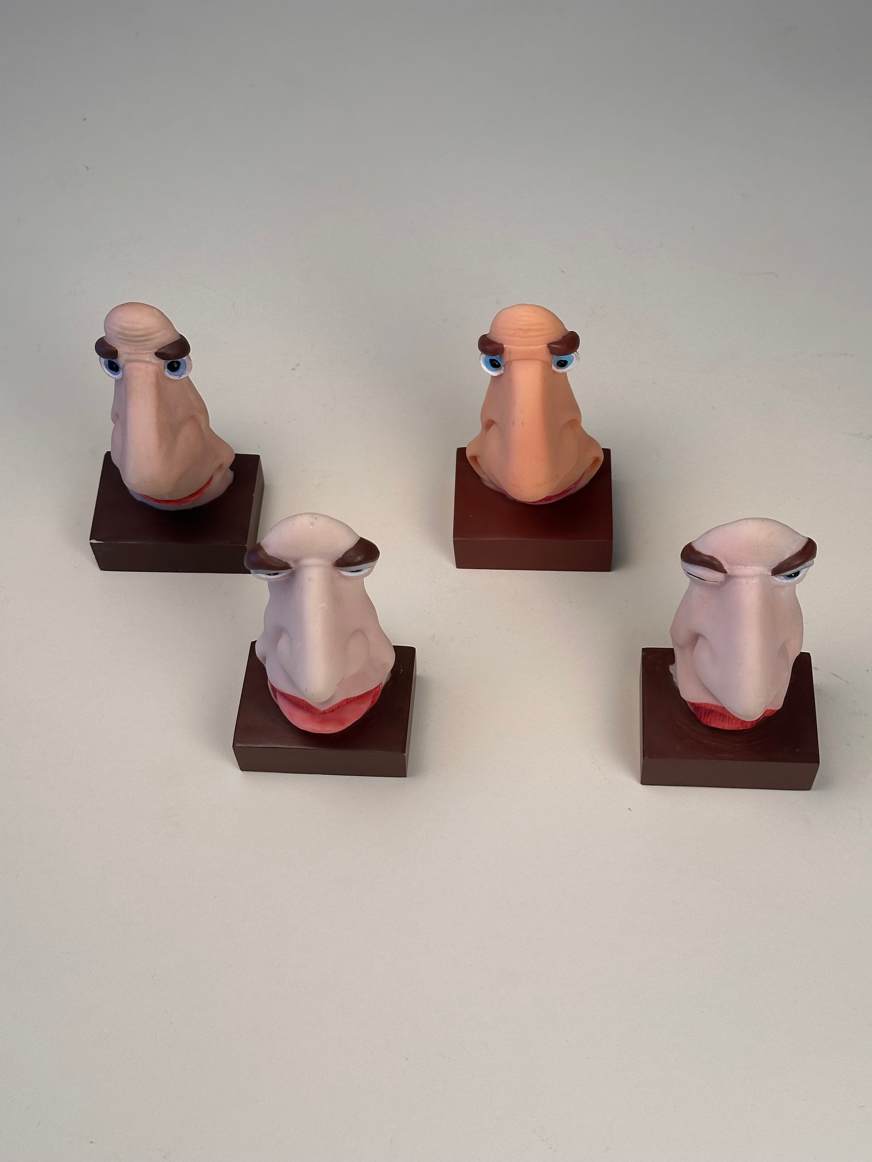 Set de 4 supports à lunettes visage caricatural, vintage