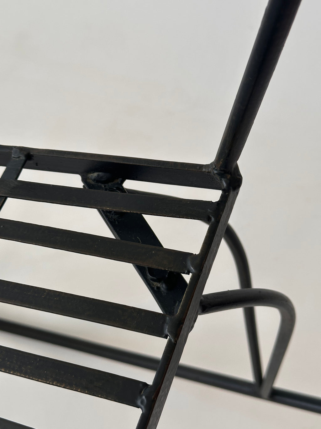 Chaise à bascule artisanale en fer forgé