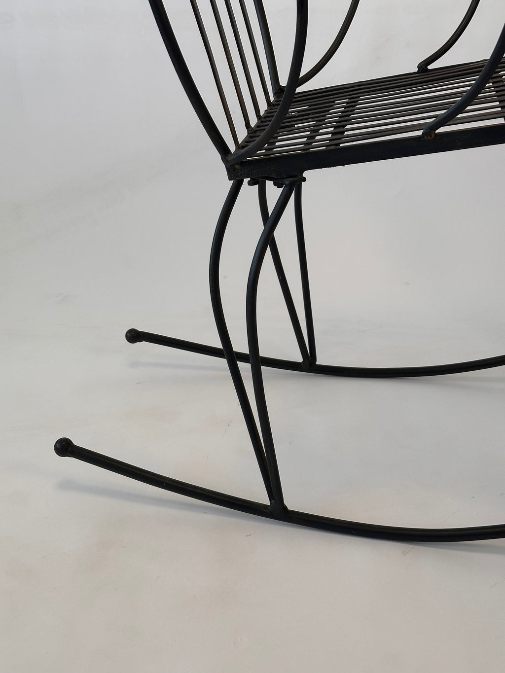 Chaise à bascule artisanale en fer forgé