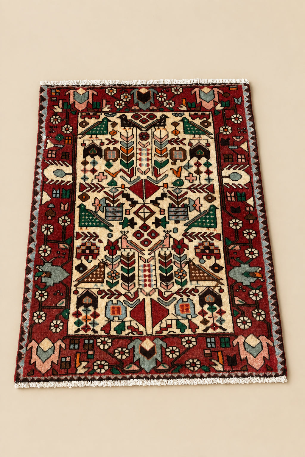 Tapis vintage à décor d’oiseaux et de fleurs, noué à la main