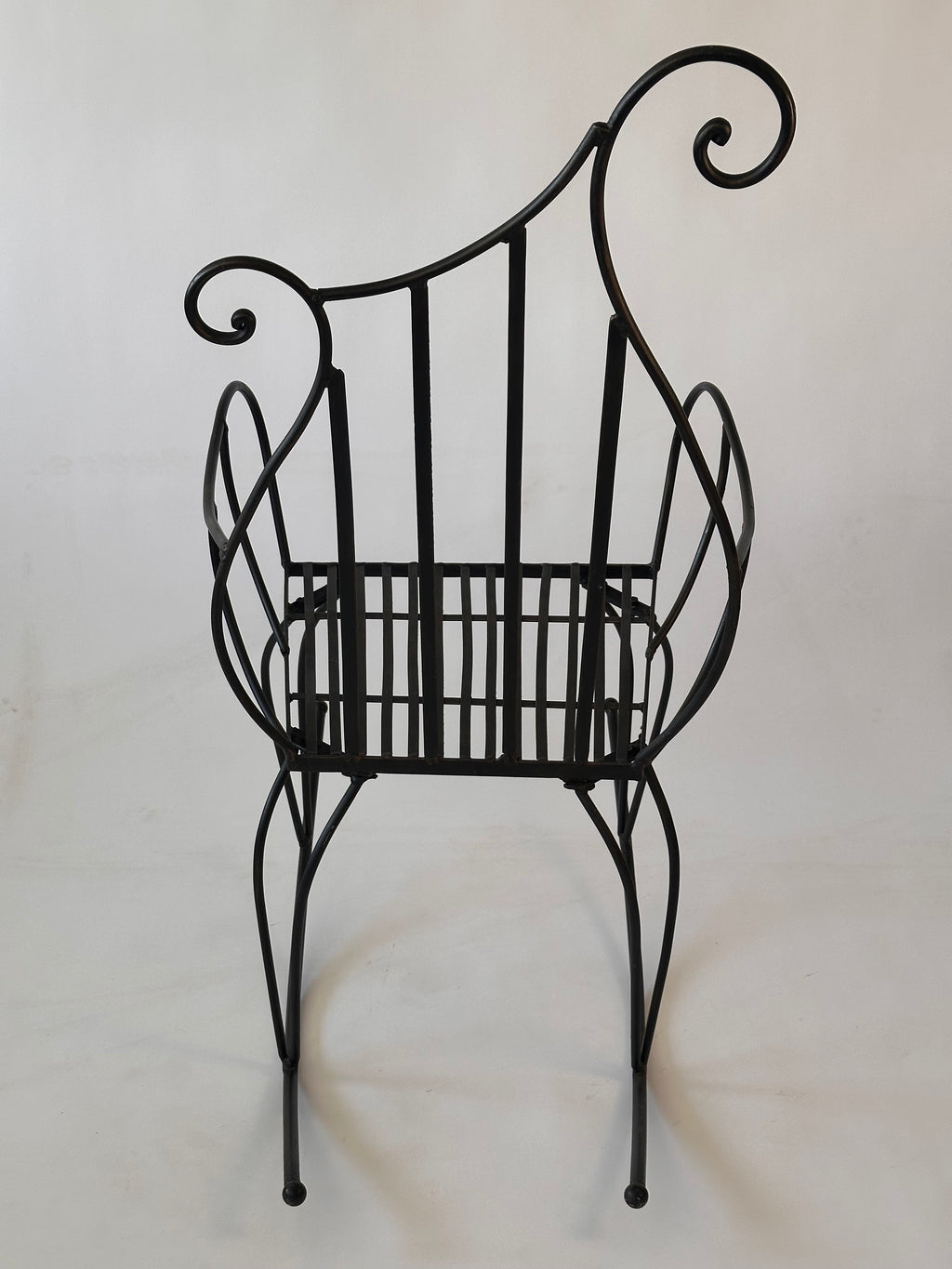 Chaise à bascule artisanale en fer forgé