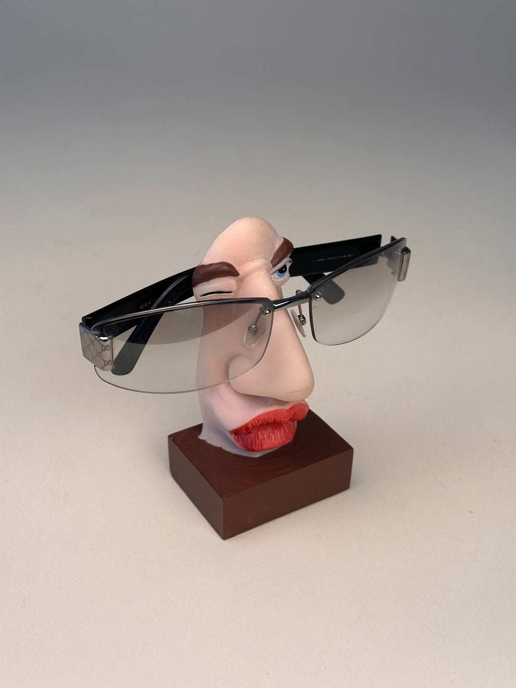 Set de 4 supports à lunettes visage caricatural, vintage