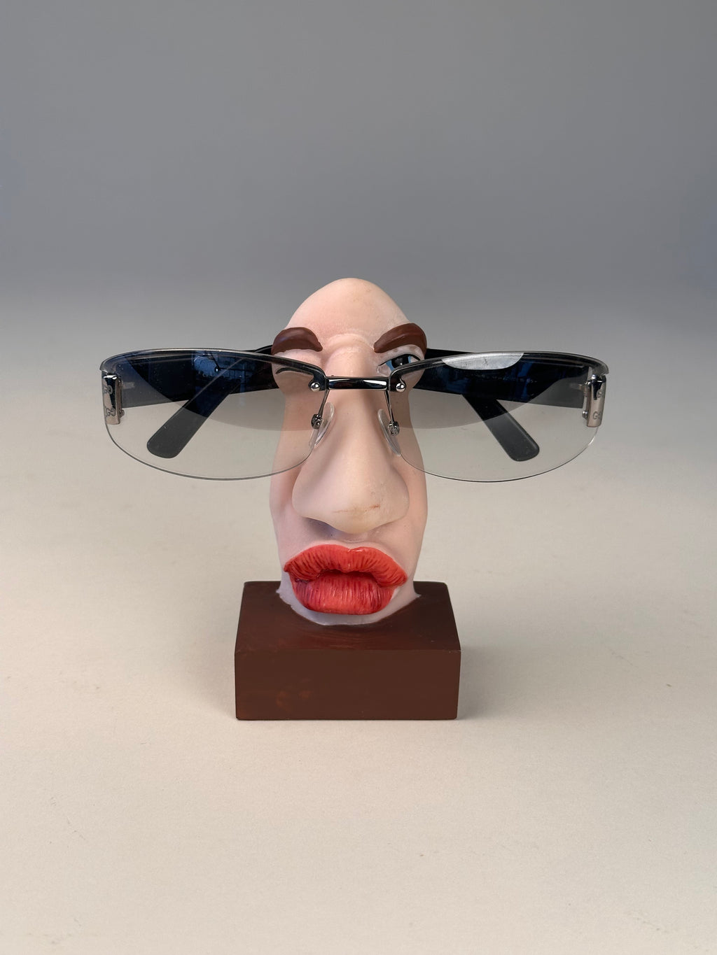 Set de 4 supports à lunettes visage caricatural, vintage