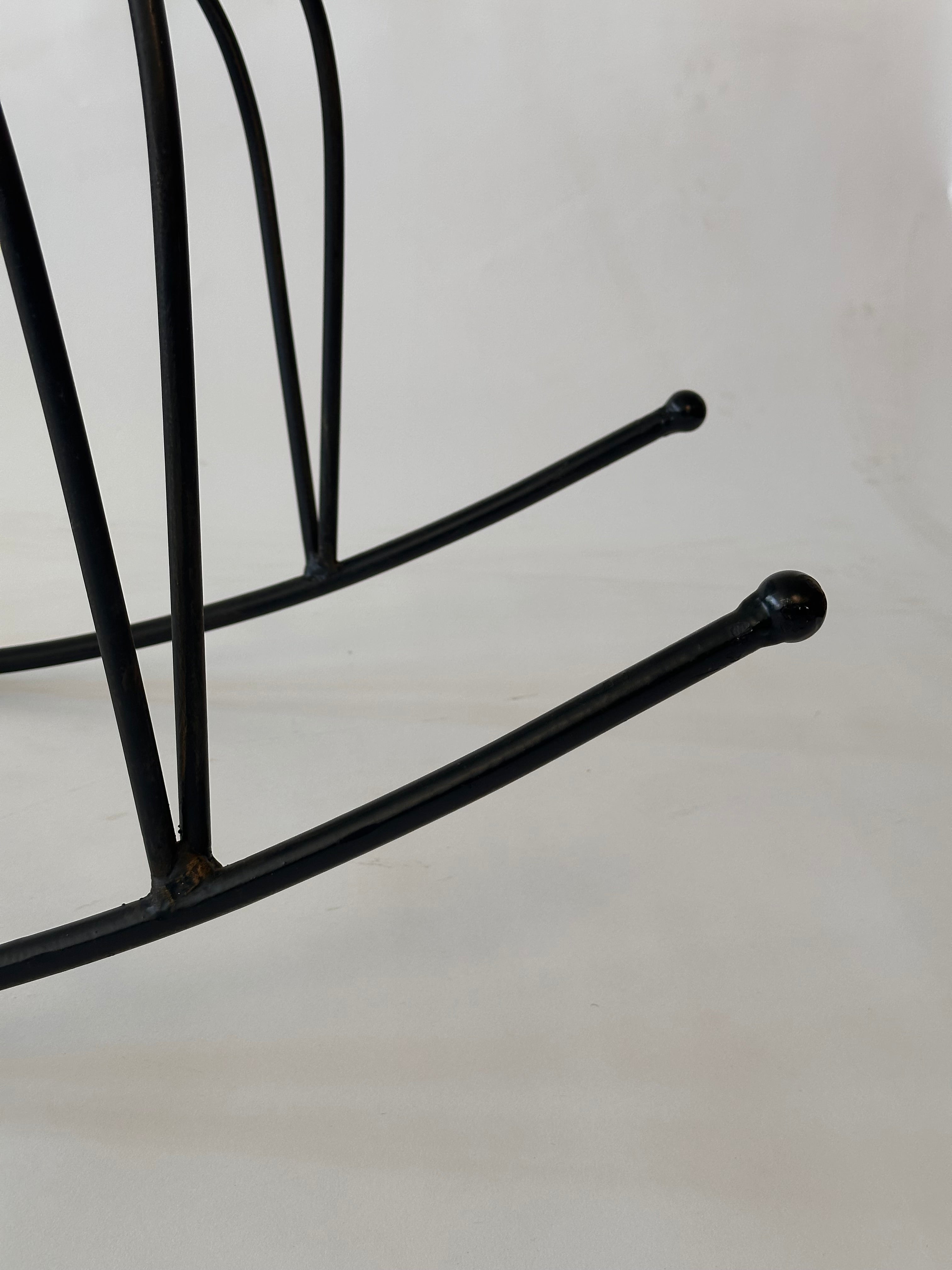 Chaise à bascule artisanale en fer forgé