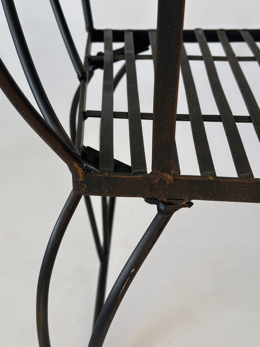 Chaise à bascule artisanale en fer forgé